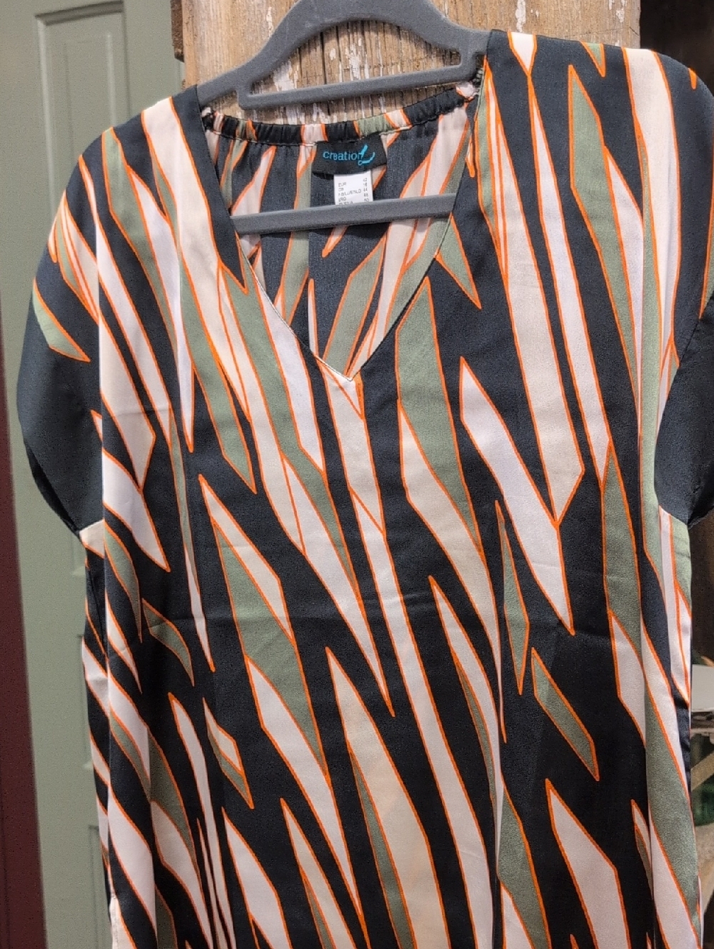 Creation V-Neck Black Blouse with Cream and Olive Stripe Print